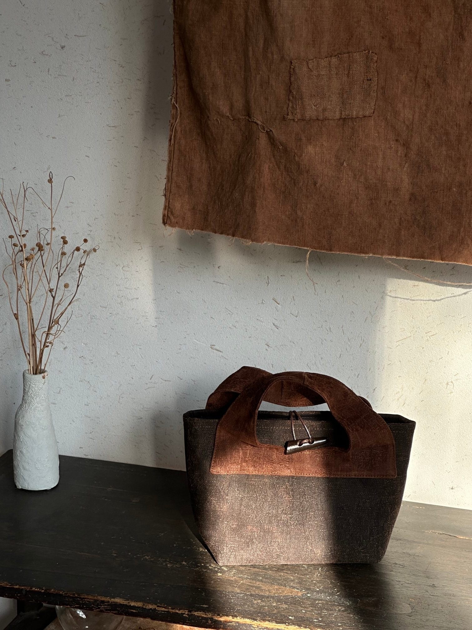 Traditional silk leather purse featuring Chinese heritage craftsmanship
