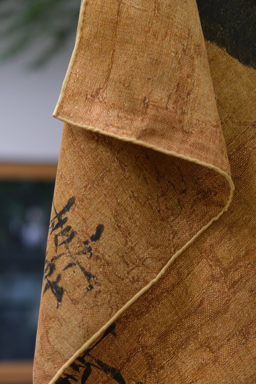 Artisan crafted silk scarf with unique details