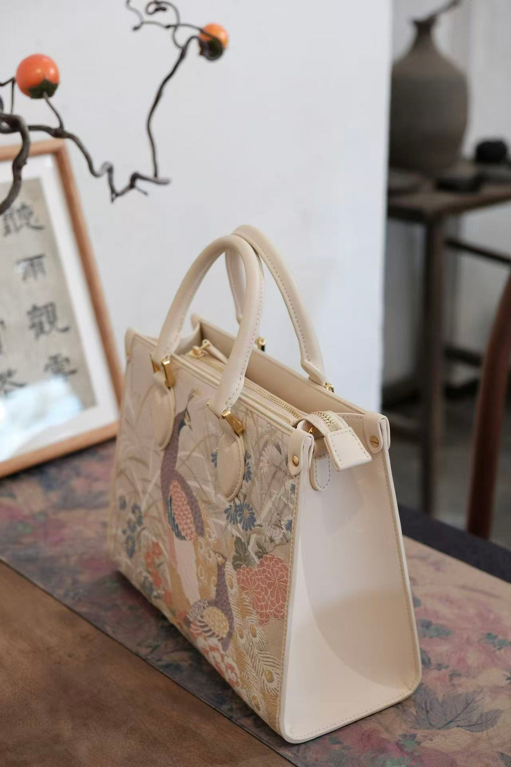 Modern fashion handbag featuring authentic Nishijin silk