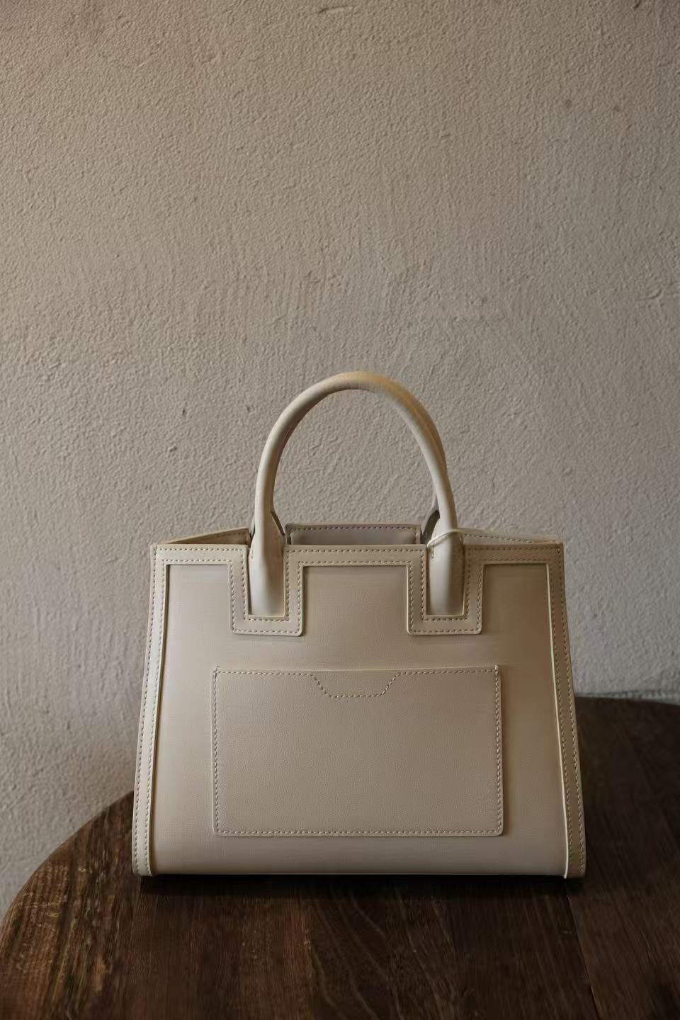 Artisan crafted Songjin silk handbag collection
