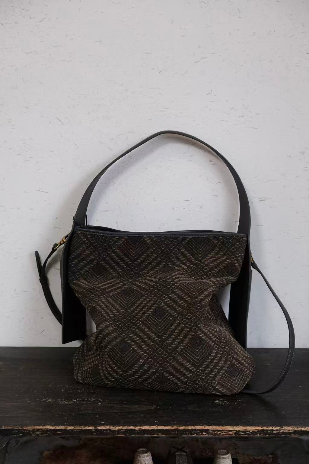 Chinese heritage inspired Xiangyunsha silk handbag design
