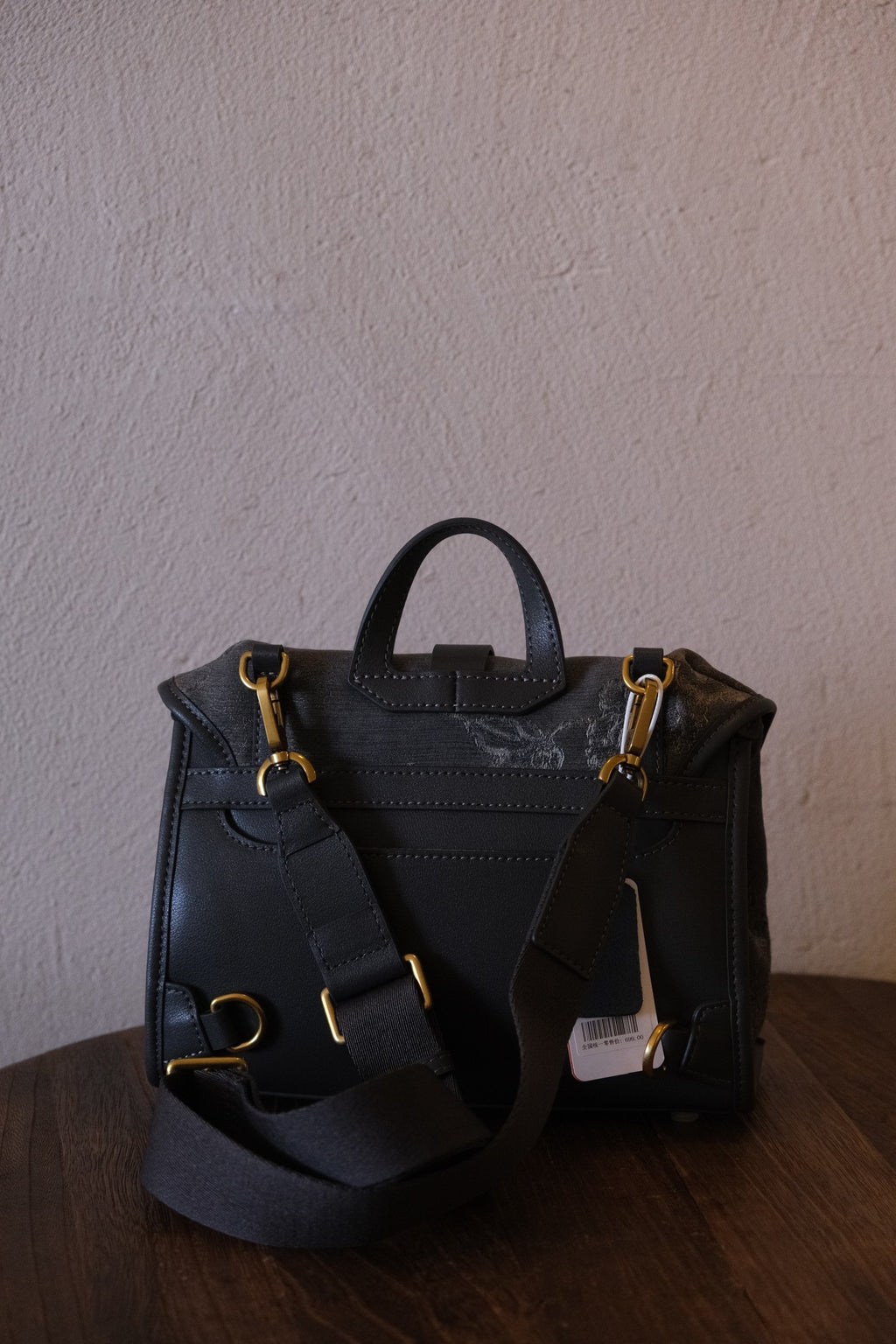 Back view of grey floral Xiangyunsha convertible satchel backpack