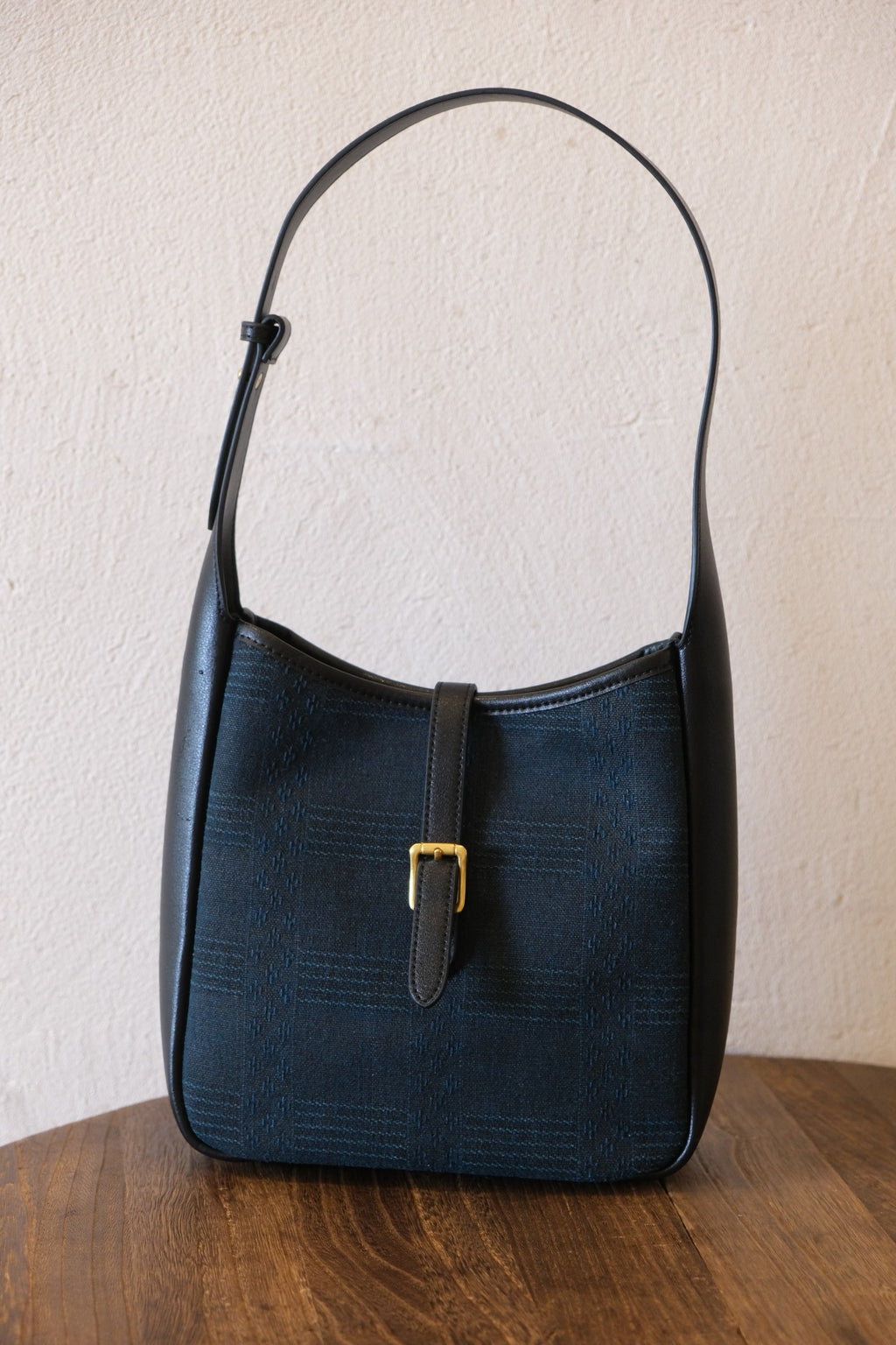 Xiangyunsha cowhide hobo bag front view, heritage Chinese fabric underarm shoulder bag
