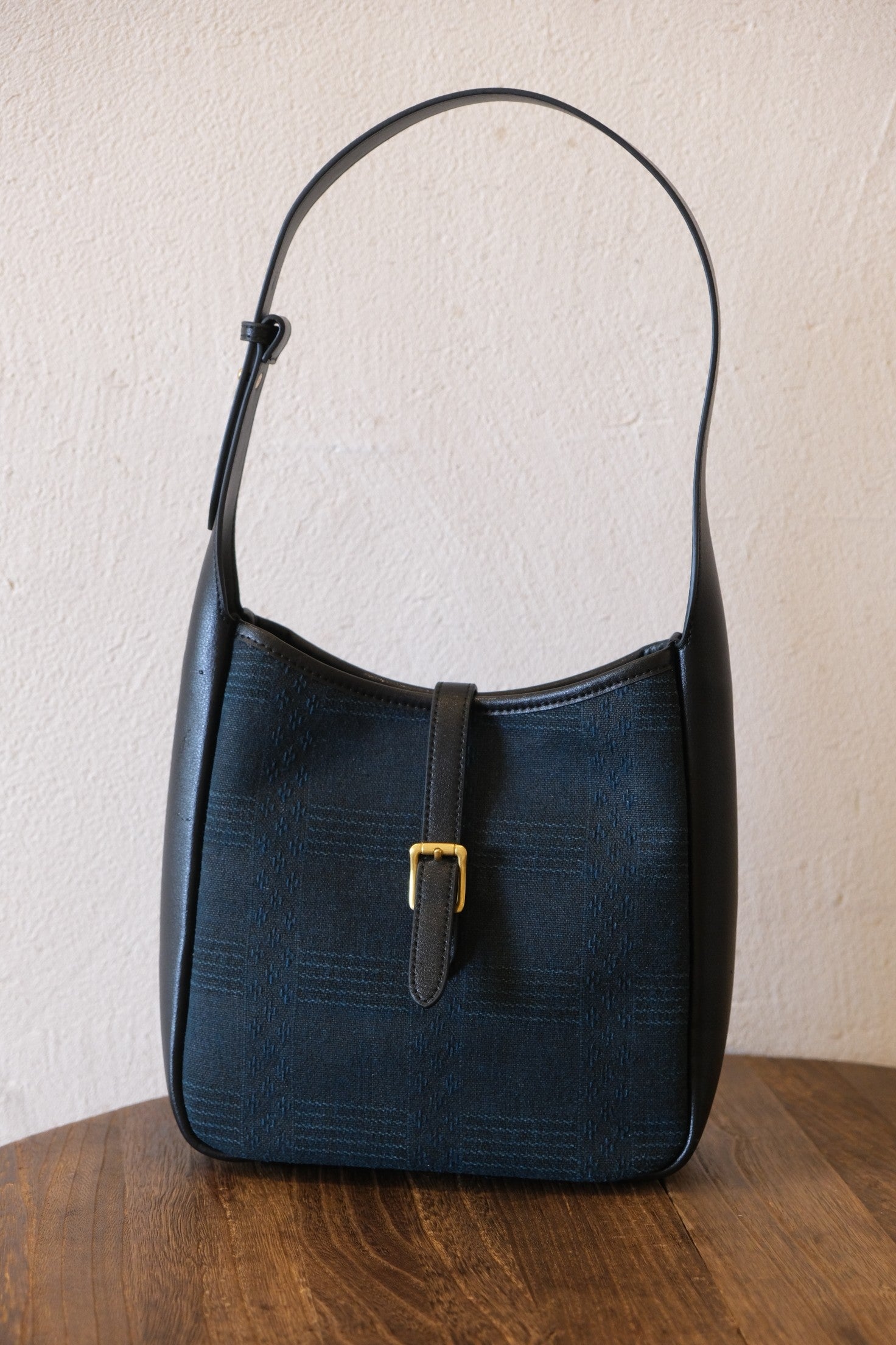 Xiangyunsha cowhide hobo bag front view, heritage Chinese fabric underarm shoulder bag